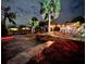 Night view of backyard oasis with waterway access at 2474 Como St, Port Charlotte, FL 33948