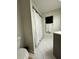 Clean bathroom with shower and tiled floor at 2474 Como St, Port Charlotte, FL 33948