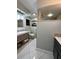Updated bathroom with walk-in shower and modern vanity at 2474 Como St, Port Charlotte, FL 33948