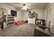 Bright bedroom with built-in shelving and plush carpet at 2474 Como St, Port Charlotte, FL 33948