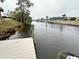 Private dock on a tranquil waterway at 2474 Como St, Port Charlotte, FL 33948