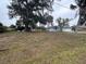 House with large grassy yard and water access at 2474 Como St, Port Charlotte, FL 33948