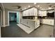 Modern kitchen with white shaker cabinets and stainless steel appliances at 2474 Como St, Port Charlotte, FL 33948