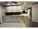 Modern kitchen with white shaker cabinets and stainless steel appliances at 2474 Como St, Port Charlotte, FL 33948