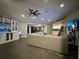 Spacious living room with tile floors and built in cabinetry at 2474 Como St, Port Charlotte, FL 33948