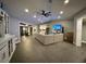 Spacious living room with tile floors and built in cabinetry at 2474 Como St, Port Charlotte, FL 33948