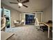 Home office with barn doors opening to pool area at 2474 Como St, Port Charlotte, FL 33948