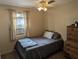 Small bedroom with a double bed and dresser at 2488 Warne St, Port Charlotte, FL 33952