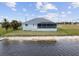 House with screened porch and waterfront access at 27 Meadowlark Ln, Placida, FL 33946