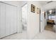 Guest bathroom with toilet and adjacent hallway at 27 Meadowlark Ln, Placida, FL 33946