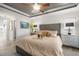 Spacious primary bedroom with a plush bed and water view at 27 Meadowlark Ln, Placida, FL 33946