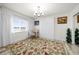 Well-lit bedroom with a murphy bed and water view at 27 Meadowlark Ln, Placida, FL 33946