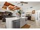 Open kitchen with large island, stainless steel appliances at 27 Meadowlark Ln, Placida, FL 33946