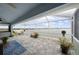 Spacious screened patio overlooking a lake at 27 Meadowlark Ln, Placida, FL 33946