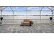 Serene screened patio with lake view at 27 Meadowlark Ln, Placida, FL 33946