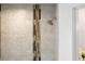 Close-up of shower with tile detail at 27 Meadowlark Ln, Placida, FL 33946