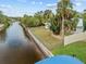 Aerial view of a house and backyard on a canal at 28434 Sabal Palm Dr, Punta Gorda, FL 33982