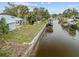 Aerial view of waterfront property with backyard and boat dock at 28434 Sabal Palm Dr, Punta Gorda, FL 33982