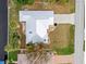 House with metal roof and landscaping at 28434 Sabal Palm Dr, Punta Gorda, FL 33982