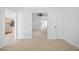 Spacious bedroom with view of kitchen and bathroom at 28434 Sabal Palm Dr, Punta Gorda, FL 33982