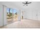 Gathering room with sliding doors leading to the patio at 28434 Sabal Palm Dr, Punta Gorda, FL 33982