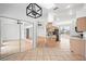 Kitchen with breakfast nook and access to sunroom at 28434 Sabal Palm Dr, Punta Gorda, FL 33982