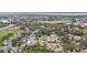 Property location highlighted in a neighborhood setting near golf course and water at 3112 Club Dr # 124, Port Charlotte, FL 33953