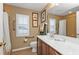 Bathroom with double vanity, toilet and shower, accessible features at 3112 Club Dr # 124, Port Charlotte, FL 33953