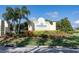 Riverwood community entrance sign with landscaping at 3112 Club Dr # 124, Port Charlotte, FL 33953