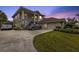 Attractive two-story home with attached garage and manicured lawn at 3112 Club Dr # 124, Port Charlotte, FL 33953