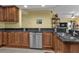 Modern kitchen featuring stainless steel appliances and granite countertops at 3112 Club Dr # 124, Port Charlotte, FL 33953