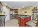 Updated kitchen with stainless steel appliances and breakfast bar at 3112 Club Dr # 124, Port Charlotte, FL 33953