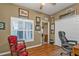 Home office with a comfortable chair, desk, and plenty of storage at 3112 Club Dr # 124, Port Charlotte, FL 33953