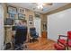 Home office with two executive chairs, a desk, and built-in murphy bed at 3112 Club Dr # 124, Port Charlotte, FL 33953