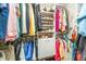 Well-organized walk-in closet with ample shelving and hanging space at 3112 Club Dr # 124, Port Charlotte, FL 33953
