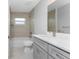 Clean bathroom with a bathtub, toilet and vanity at 3329 Casco Cir, North Port, FL 34288