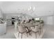 Kitchen and dining area with modern chandelier at 3329 Casco Cir, North Port, FL 34288