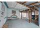 Covered back patio with seating area and storage space at 3461 Normandy Dr, Port Charlotte, FL 33952