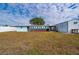 Large backyard with home and shed, fenced at 3461 Normandy Dr, Port Charlotte, FL 33952