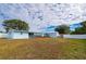 Large backyard with home and shed, fenced at 3461 Normandy Dr, Port Charlotte, FL 33952
