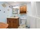 Bathroom with walk-in shower, toilet and vanity at 3461 Normandy Dr, Port Charlotte, FL 33952