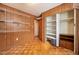 Spacious closet with shelving and wood paneling at 3461 Normandy Dr, Port Charlotte, FL 33952