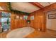 Charming entryway with wood walls and a cozy rug at 3461 Normandy Dr, Port Charlotte, FL 33952