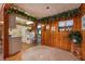 Bright kitchen features white appliances and wood flooring at 3461 Normandy Dr, Port Charlotte, FL 33952