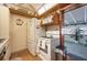 Cozy kitchen with white appliances and wood cabinets at 3461 Normandy Dr, Port Charlotte, FL 33952