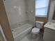 Clean bathroom with tiled shower/tub and vanity at 3739 Eldron Ave, North Port, FL 34286