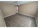 Bedroom with wood-look flooring and ceiling fan at 3739 Eldron Ave, North Port, FL 34286