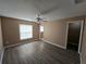 Large bedroom with a walk-in closet and vinyl flooring at 3739 Eldron Ave, North Port, FL 34286