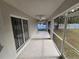 Large screened porch with access to the backyard at 3739 Eldron Ave, North Port, FL 34286