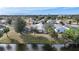 Property view from above, showcasing canal location at 428 Rose Apple Cir, Port Charlotte, FL 33954